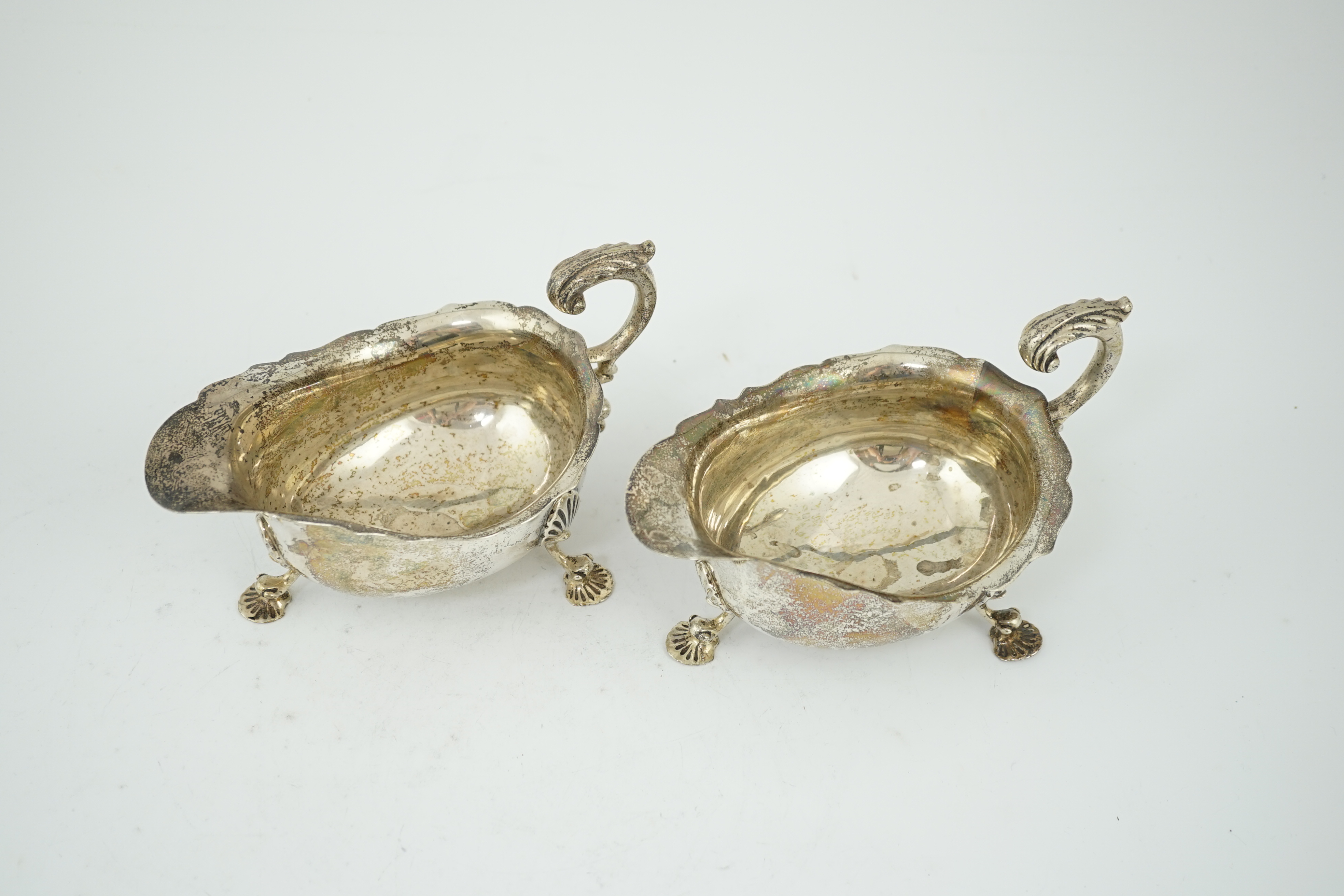 A pair of George V silver sauceboats, by Harrod's Ltd